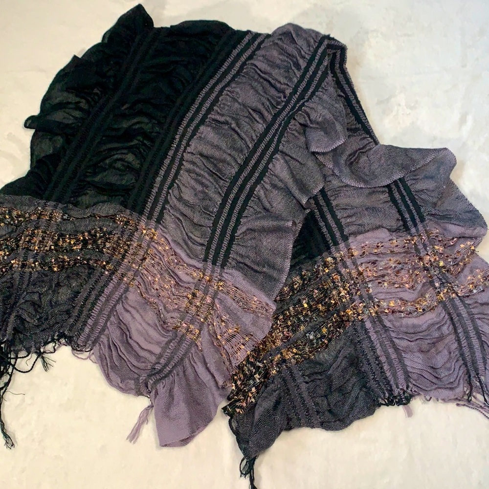 Woman’s black and gray woman’s ruffled scarf